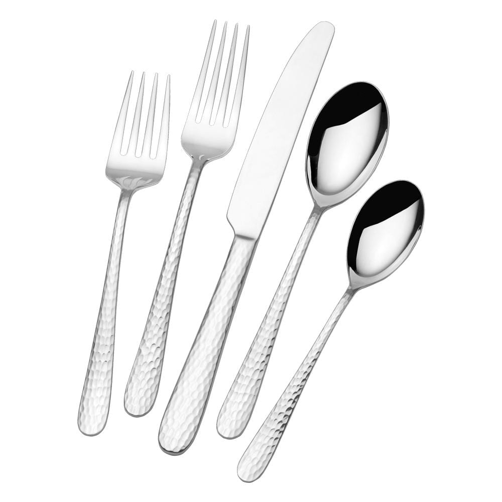 Flatware set arranged for dinner party with stainless steel finish