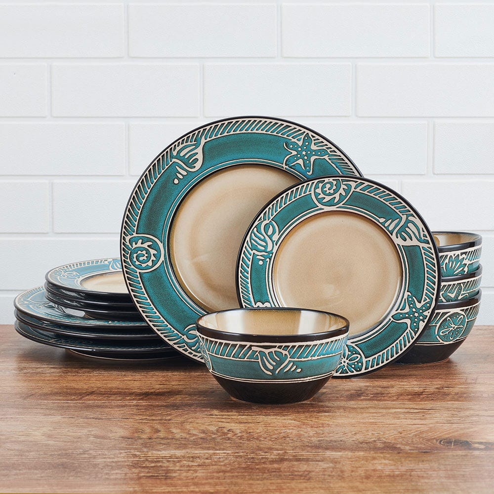 Set of four dinnerware pieces with coastal-inspired embossed design