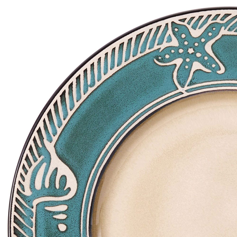 Set of four dinnerware pieces with coastal-inspired embossed design