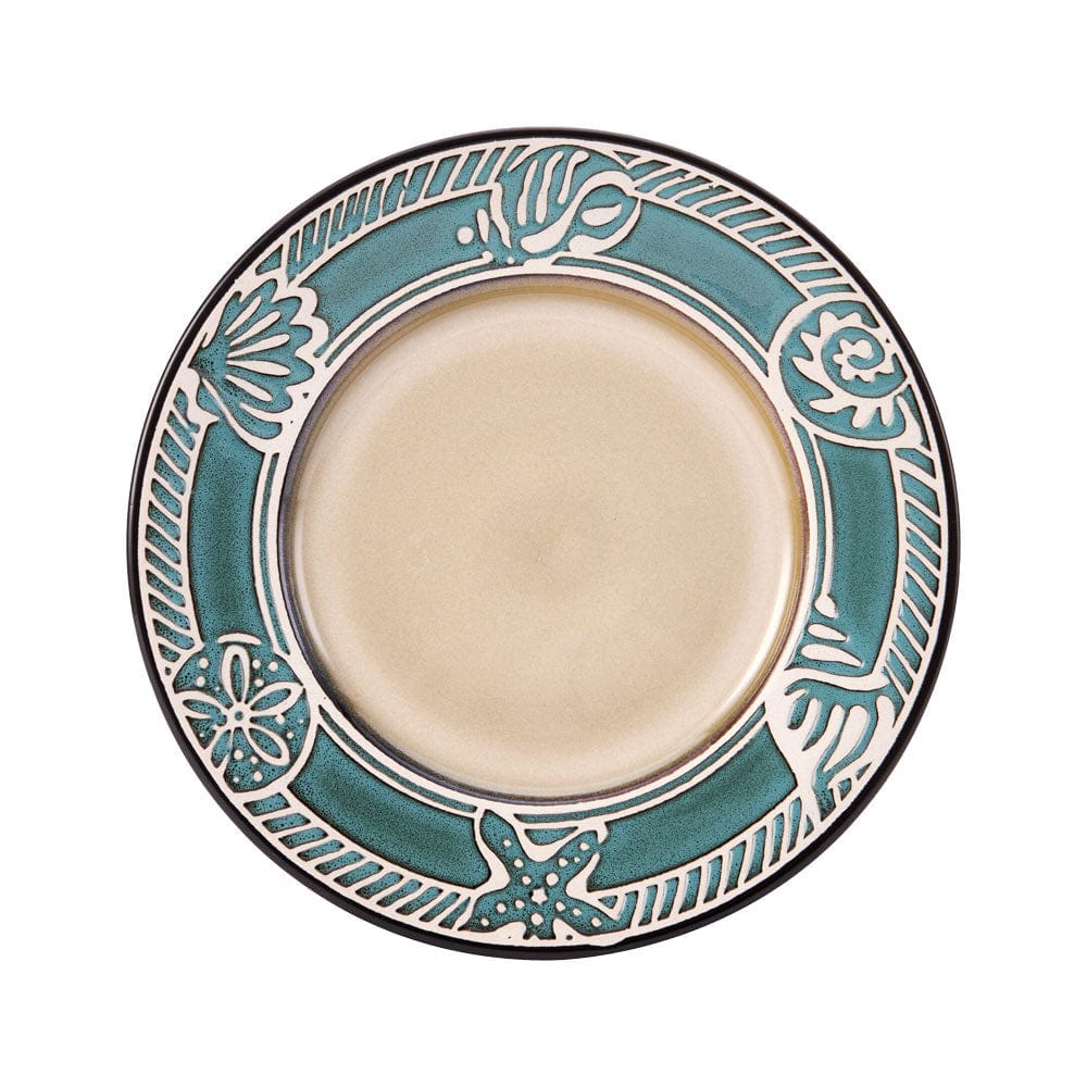 Set of four dinnerware pieces with coastal-inspired embossed design