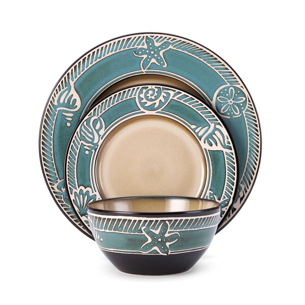 Close-up of the embossed seashell design on the stoneware dinner plate