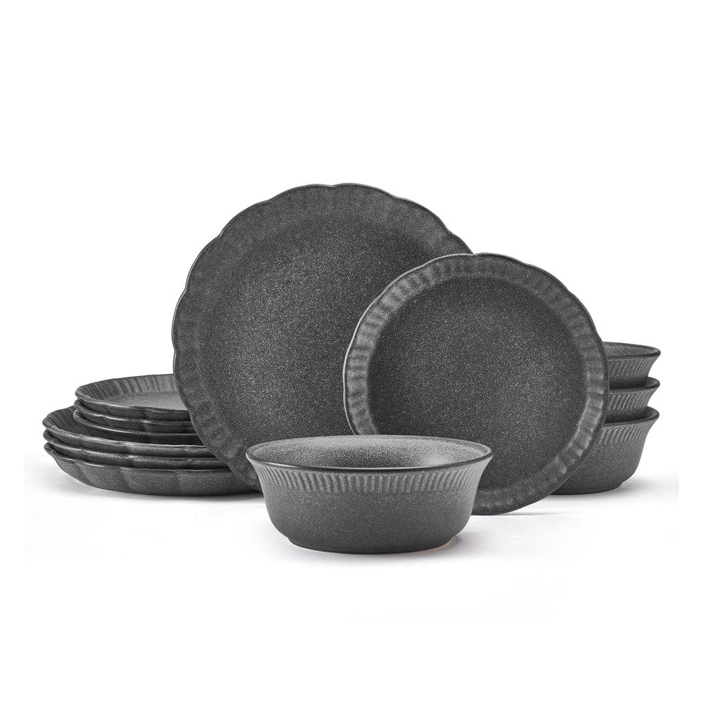 Stacked Noah dinner plates displaying the organic shape and beautiful finish.
