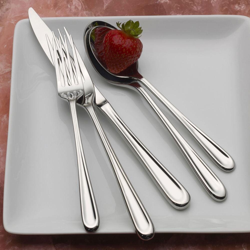 Elegant Olivia 20-piece stainless steel cutlery set displayed on a dining table
