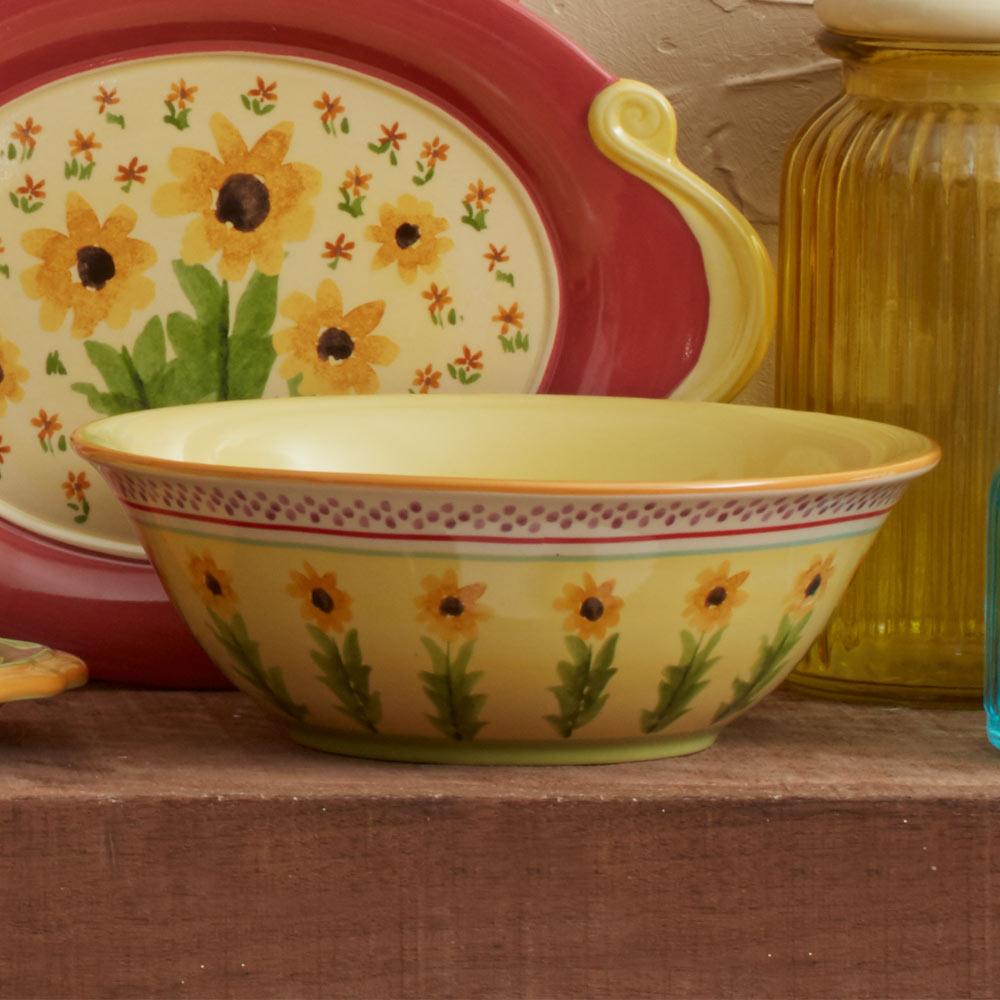 Close-up of the round stoneware bowl with pasta, showcasing its durable finish