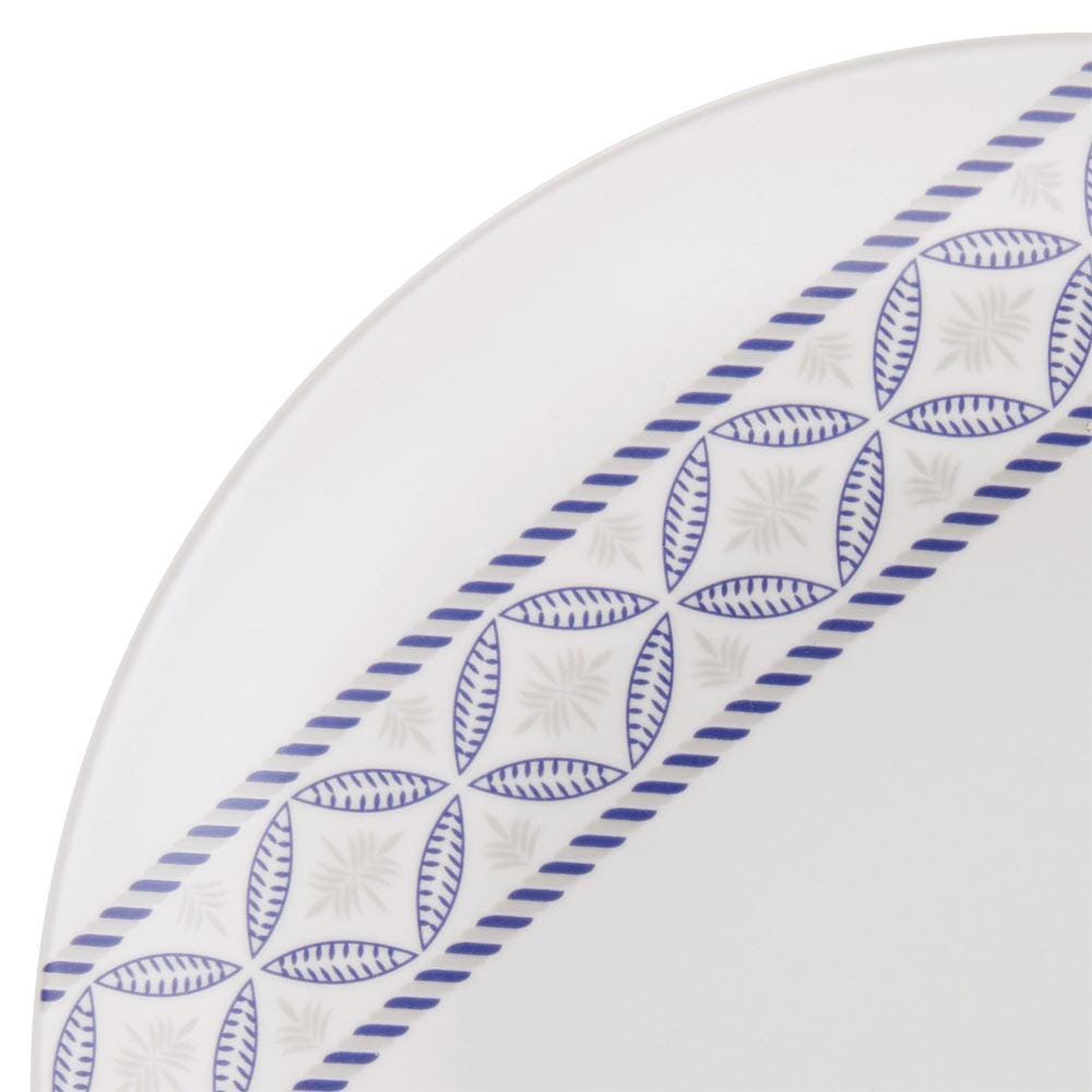 Set of porcelain plates with blue accents for six people, showcasing durability and style