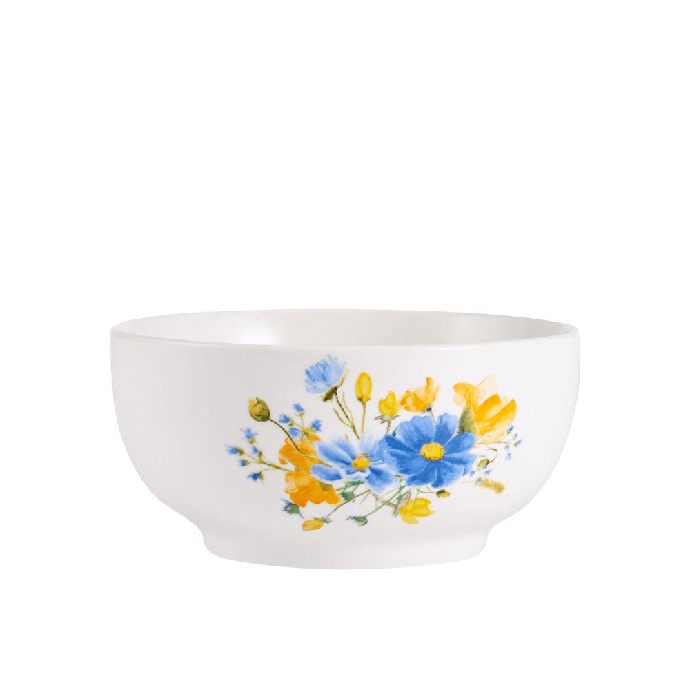 Setting of the Spring Blossom dinnerware set on a beautifully arranged table for a spring dinner.