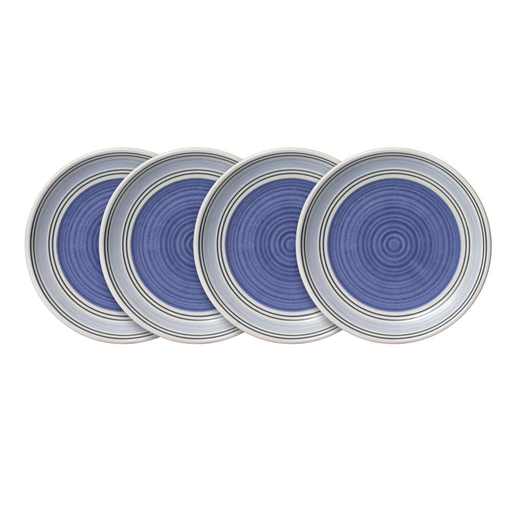 A beautifully arranged table setting featuring the Rio set of microwave safe plates alongside delicious desserts.