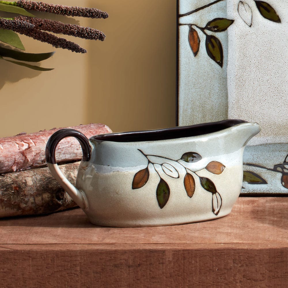 Rustic Elegance Stoneware Gravy Boat showcasing its unique glaze and design.