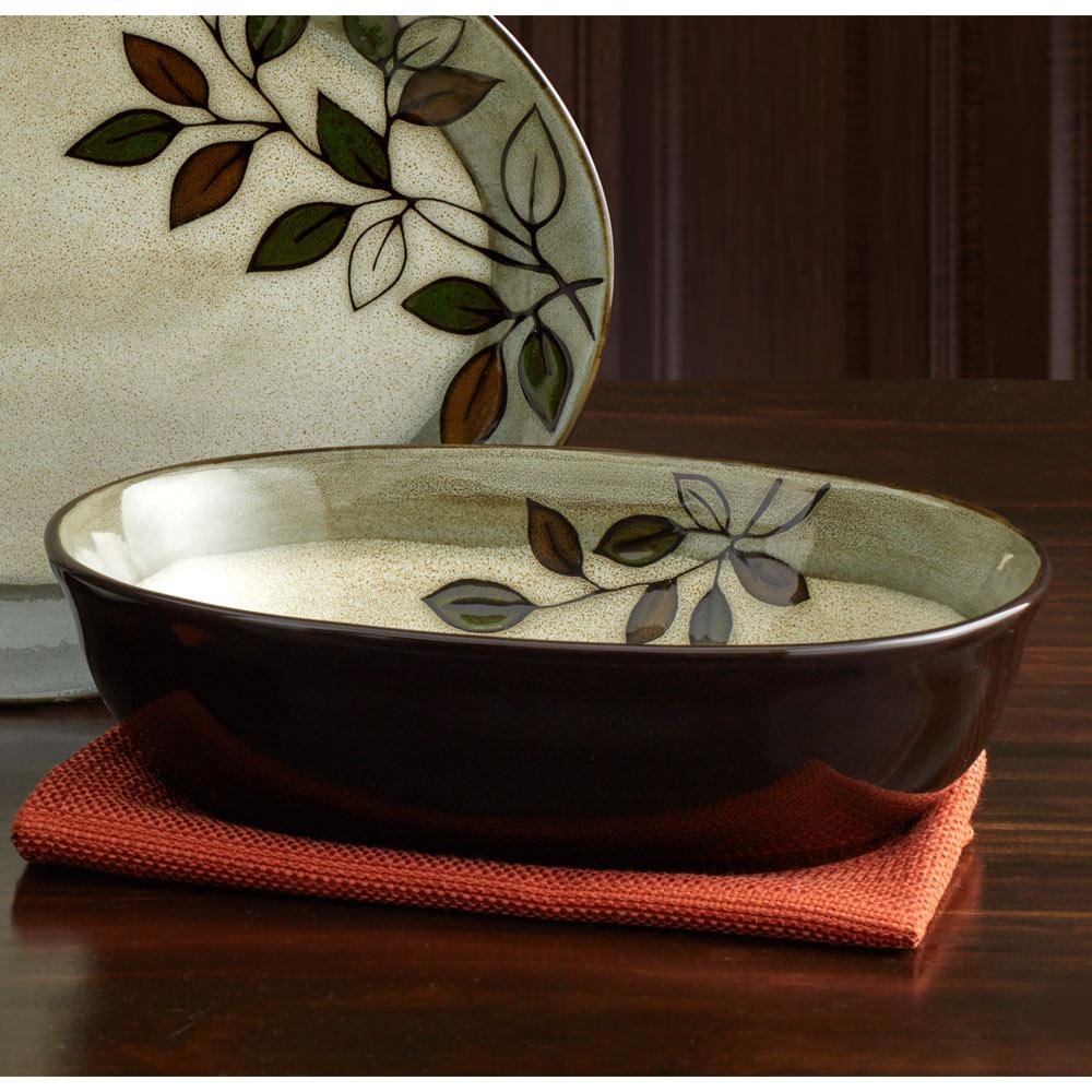 Close-up of handcrafted reactive glaze oval serve bowl showing unique glaze patterns