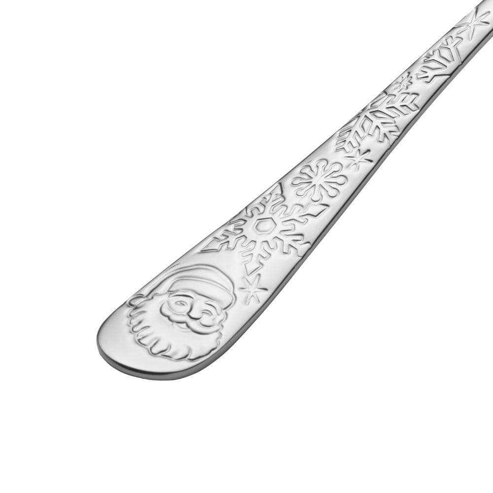Santa flatware set with snowflake design on traditional table setting