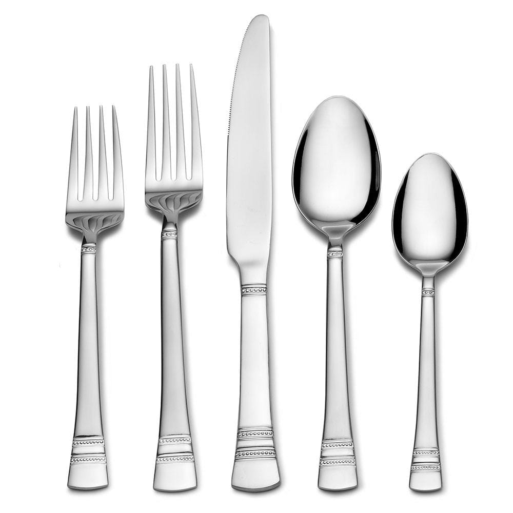 Close-up of the stainless steel dinner knife from the Sapphire Bay flatware set, highlighting its quality and shine.