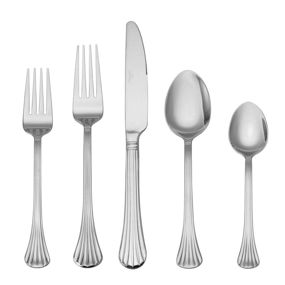 Set of stainless steel utensils arranged on a table for wedding celebration