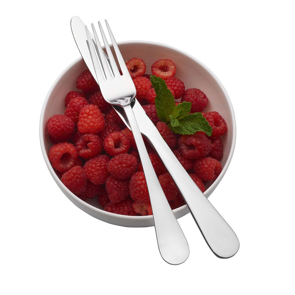 Elegance 20-Piece Stainless Steel Cutlery Set displayed on a dining table, showcasing its mirror finish and elegant design.