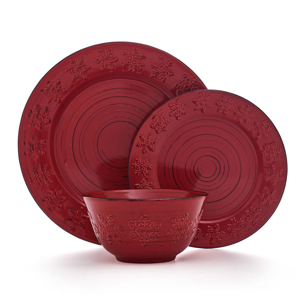 Rustic Trellis Snowflakes Dinnerware Set featuring dinner plates, salad plates, and bowls with snowflakes design on a red background.