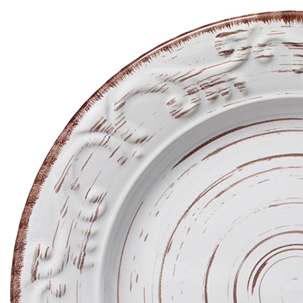 Dinnerware set for 4 arranged on a modern dining table, highlighting durability and style