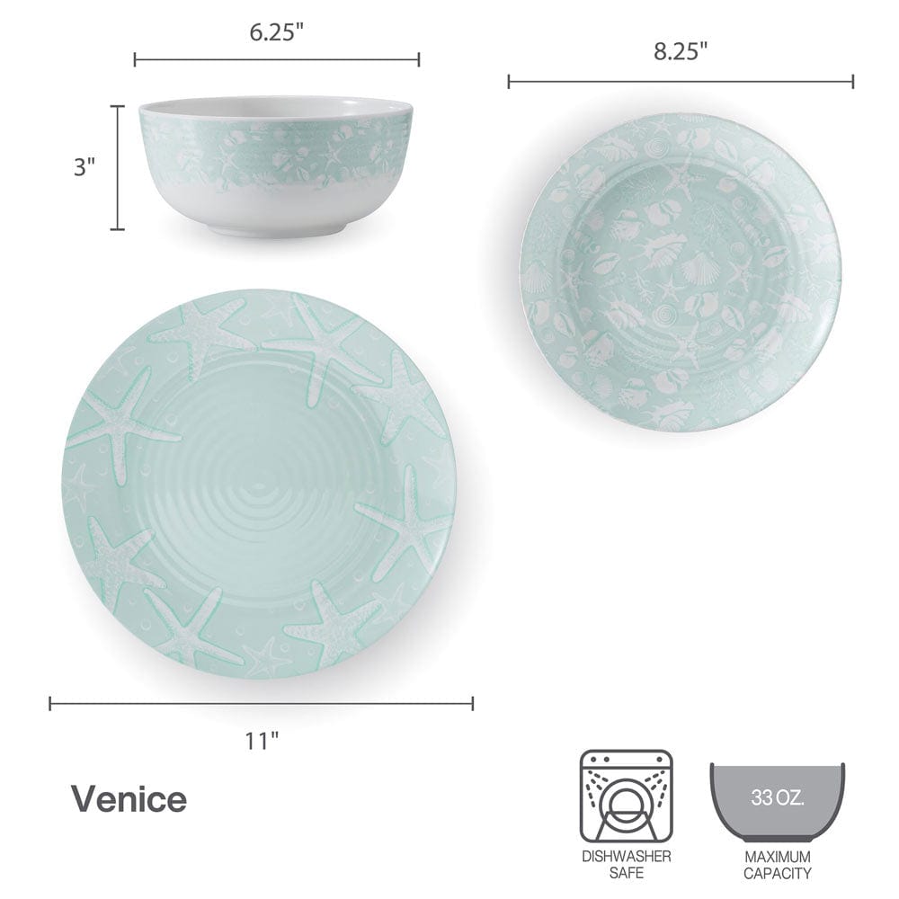 Outdoor dining setup featuring the Coastal Breeze dinnerware with fresh food and a scenic beach backdrop.
