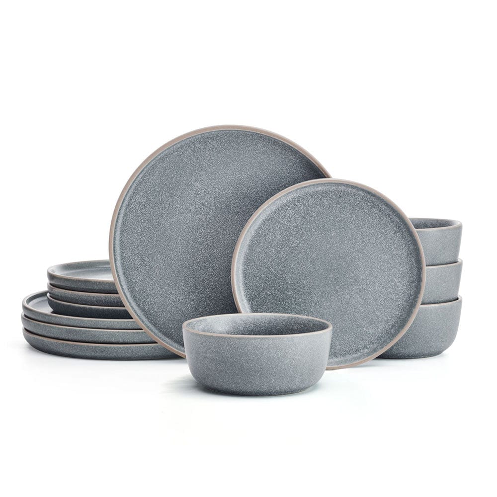 Stacked dinner plates and bowls from the Victoria 12-piece set, highlighting the handmade finish