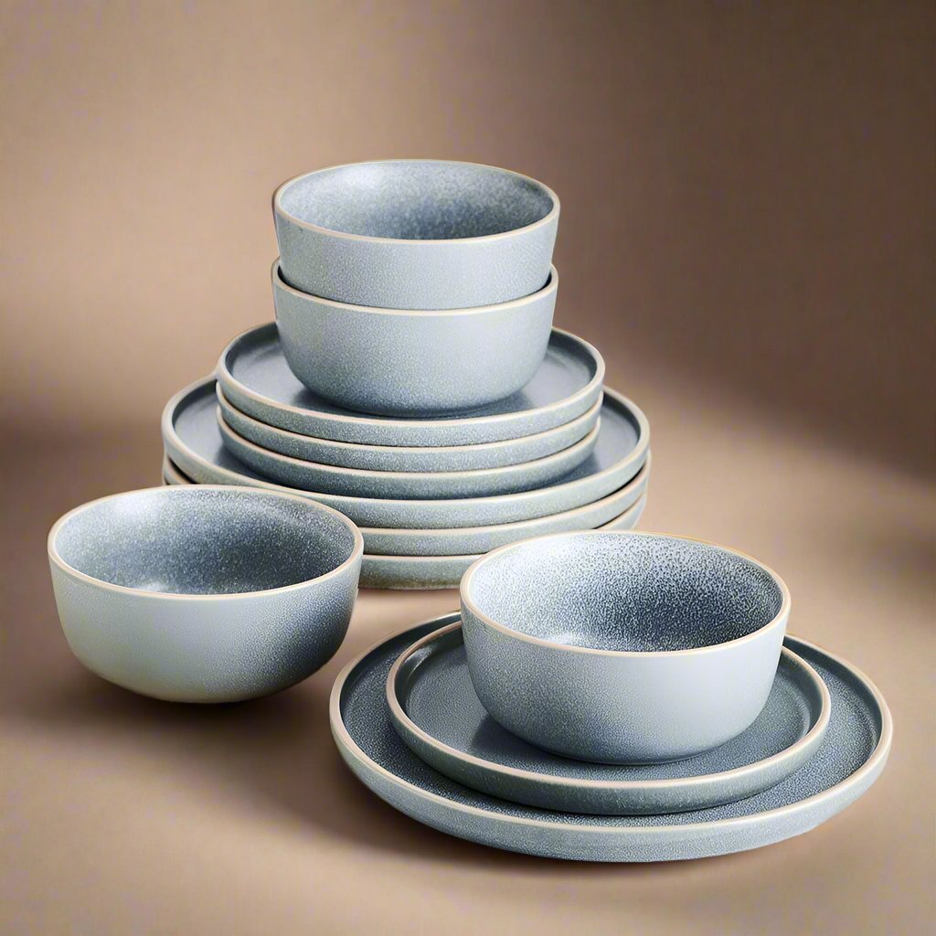 Close-up of Victoria reactive glaze stoneware dinner plates with unique color variations