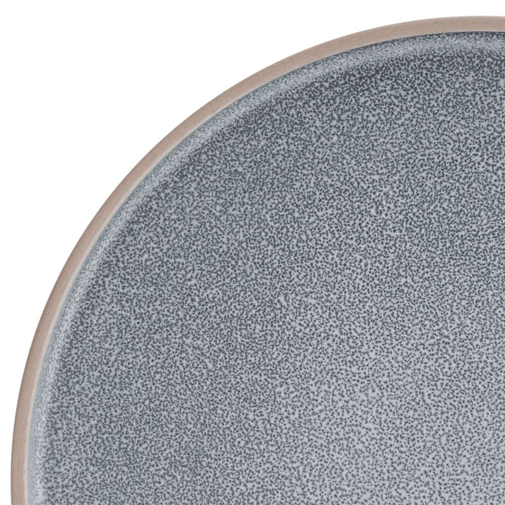 Stacked dinner plates and bowls from the Victoria 12-piece set, highlighting the handmade finish
