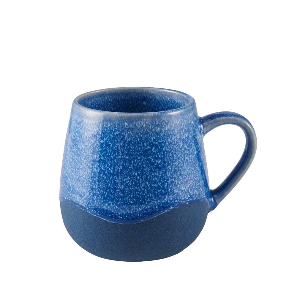Pfaltzgraff Wave mugs in use, filled with coffee and displayed on a kitchen counter.
