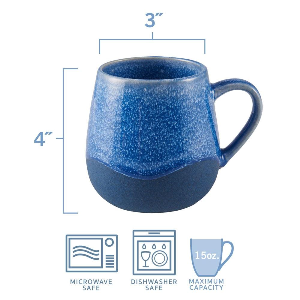 Pfaltzgraff Wave mugs in use, filled with coffee and displayed on a kitchen counter.