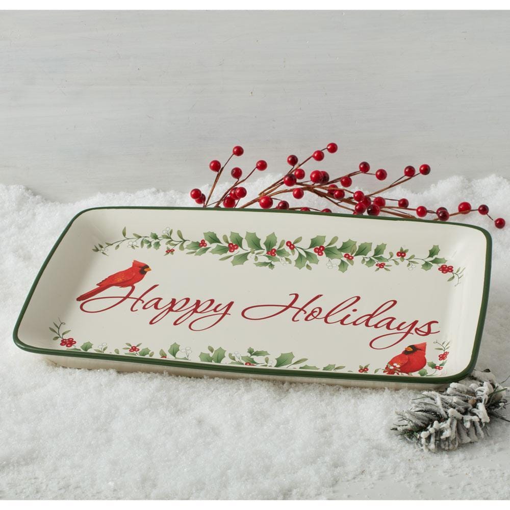 Festive rectangular serving tray with holiday decorations and red cardinals for Christmas dinner