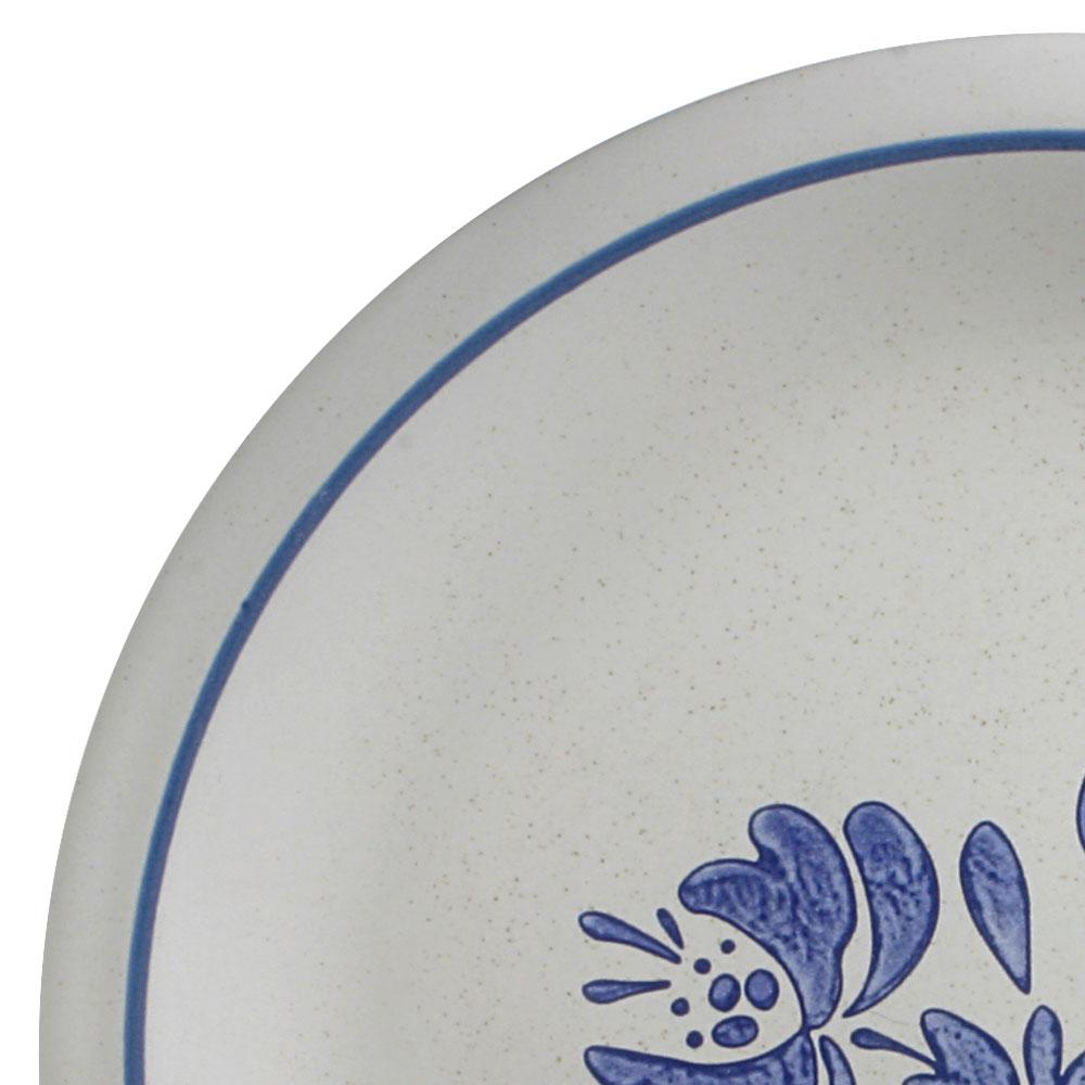 Yorktowne dinner plate set on a dining table, demonstrating its versatility for various occasions.