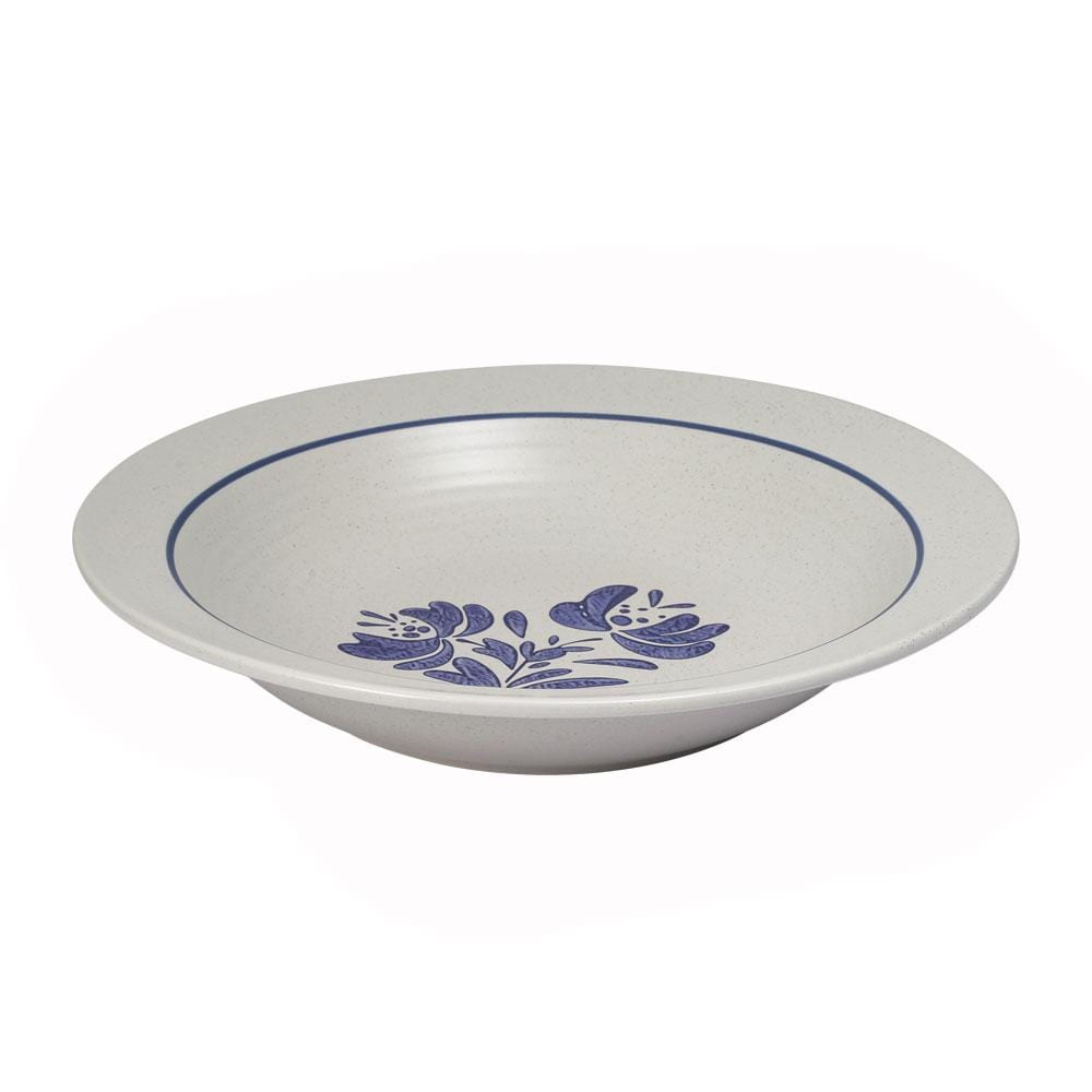Versatile stoneware dinnerware used for salad and stir fry in a modern kitchen setting