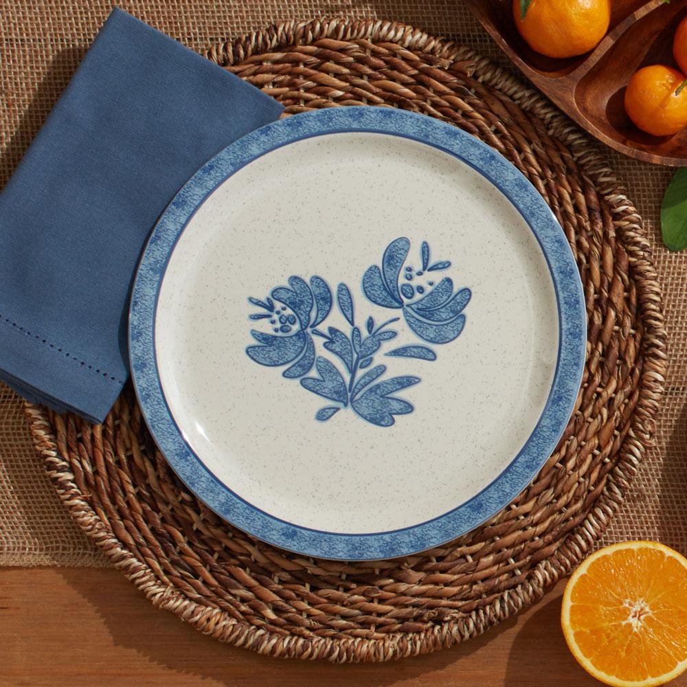 Close-up of 11-inch melamine outdoor dinner plates stacked for outdoor family dining