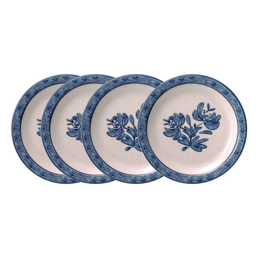 Colorful outdoor dining setup featuring melamine salad plates with fresh salads.