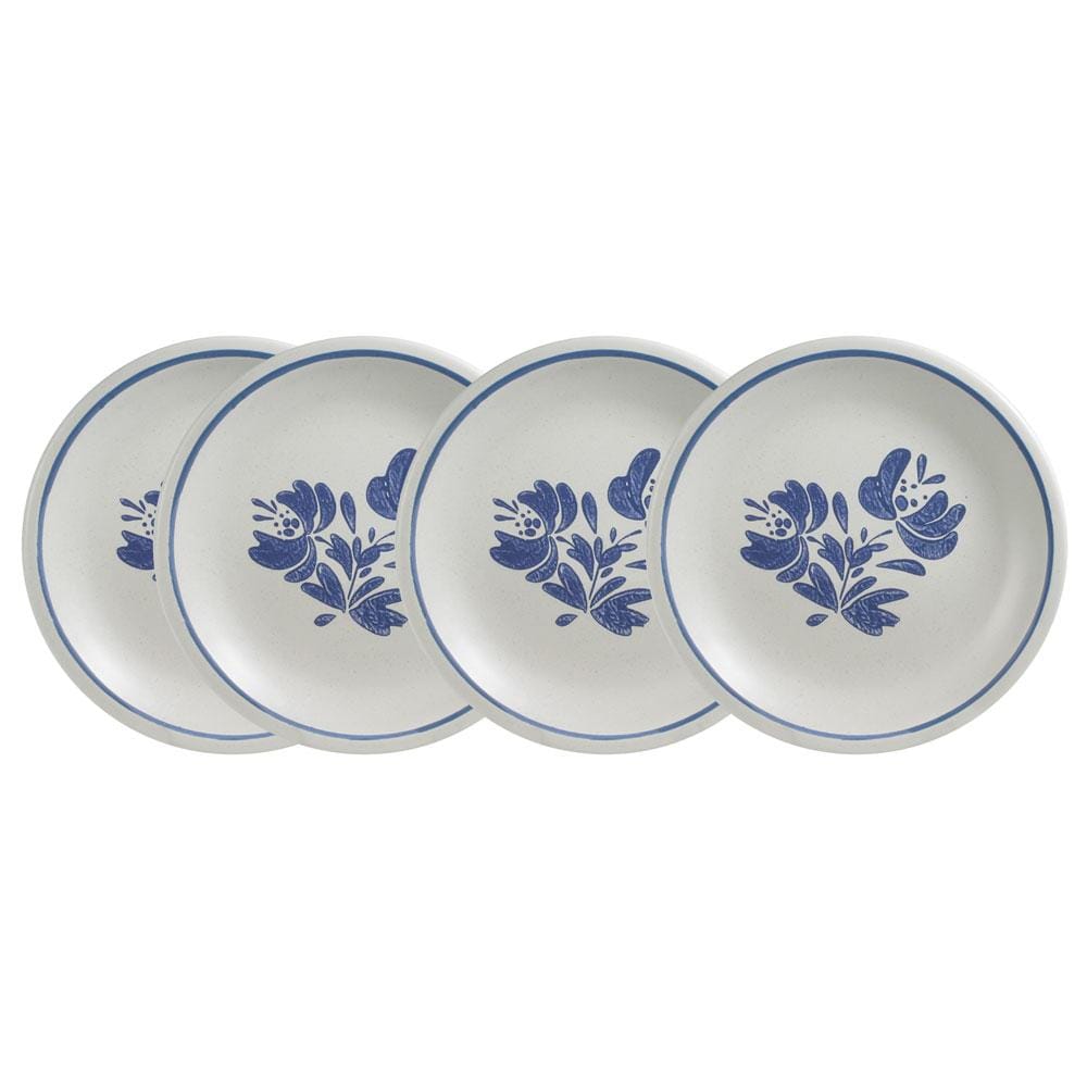 Stacked stoneware salad plates ready for serving in a modern kitchen